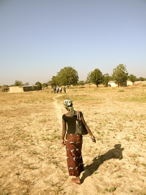 Mali rural village woman path walk