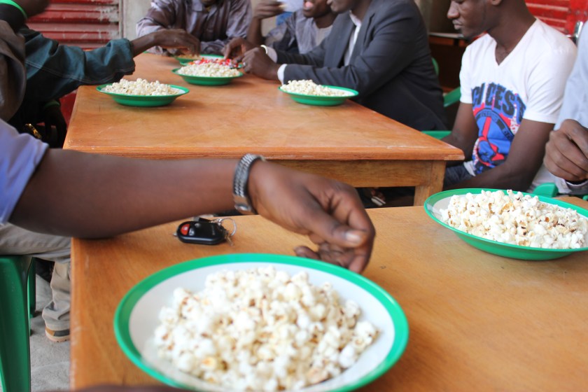 Mali Tiele village rural agriculture team colleague party popcorn candy