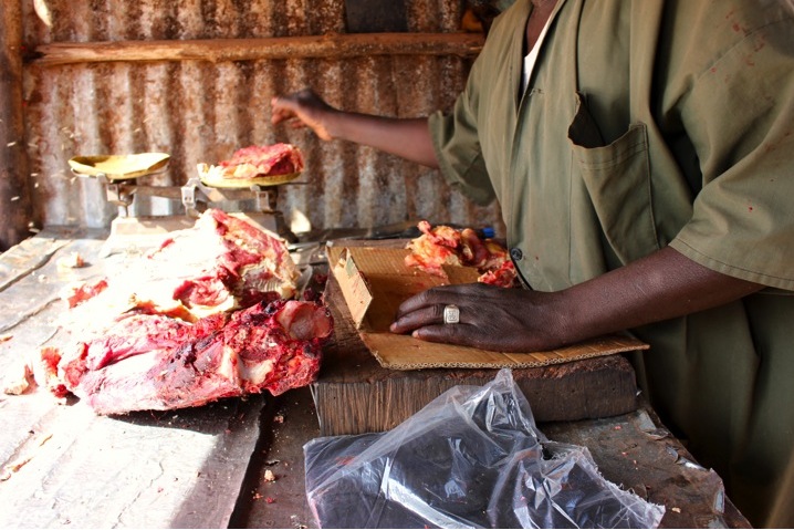 Mali Bamako urban butcher goat beef man meat raw