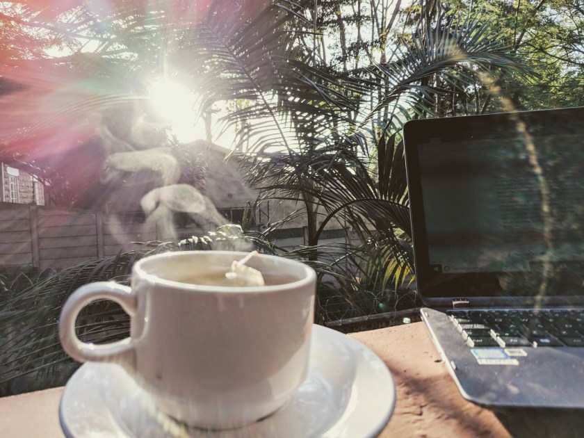 morning mug tea coffee work laptop balcony nairobi kenya steam